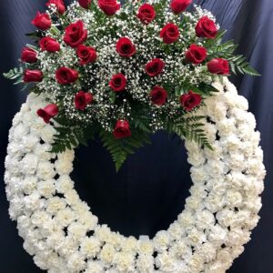 Corona funeraria de rosas y clavel